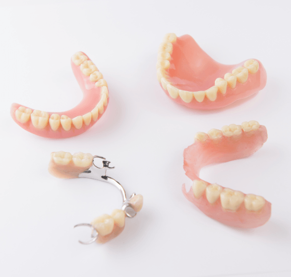 a variety of removable prosthetic devices designed to replace missing teeth